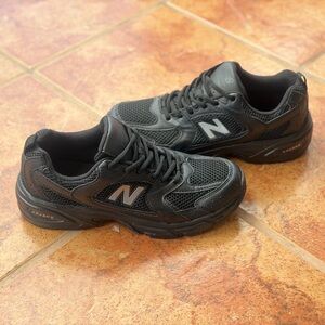 Size 9 Men’s And Women’s 10.5 - New Balance 530 Black Sneakers